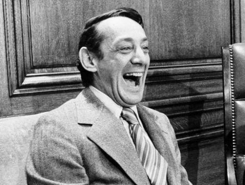 In this April 1977 file photo, San Francisco supervisor Harvey Milk sits in the mayor's office during the signing of the city's gay rights bill in San Francisco.