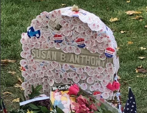 Women cover Susan B. Anthony headstone with 'I Voted' stickers on