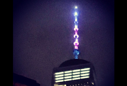 One World Trade Center lit with trans pride colors for Trans Day of Visibility