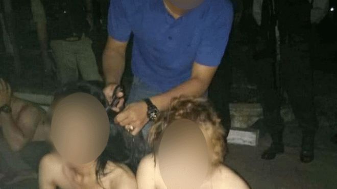 Police arrested 12 trans women & cut their hair off in public in a brutal raid