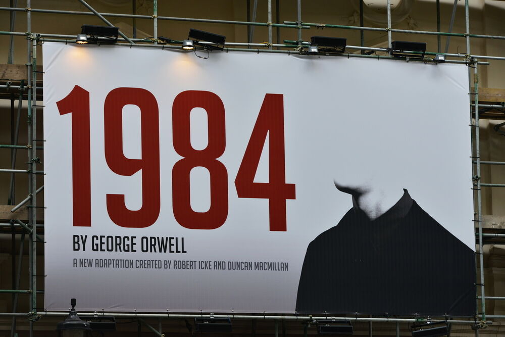 A billboard advertising Robert Icek and Ducan MacMillan's theatrical adaptation of George Orwell's Nineteen Eighty-Four on May 30, 2015 in London, UK.