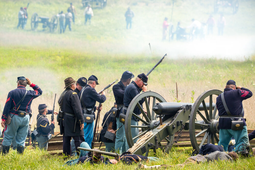 Union soldiers fight during a reenactment of the Civil War Battle of Gettysburg.