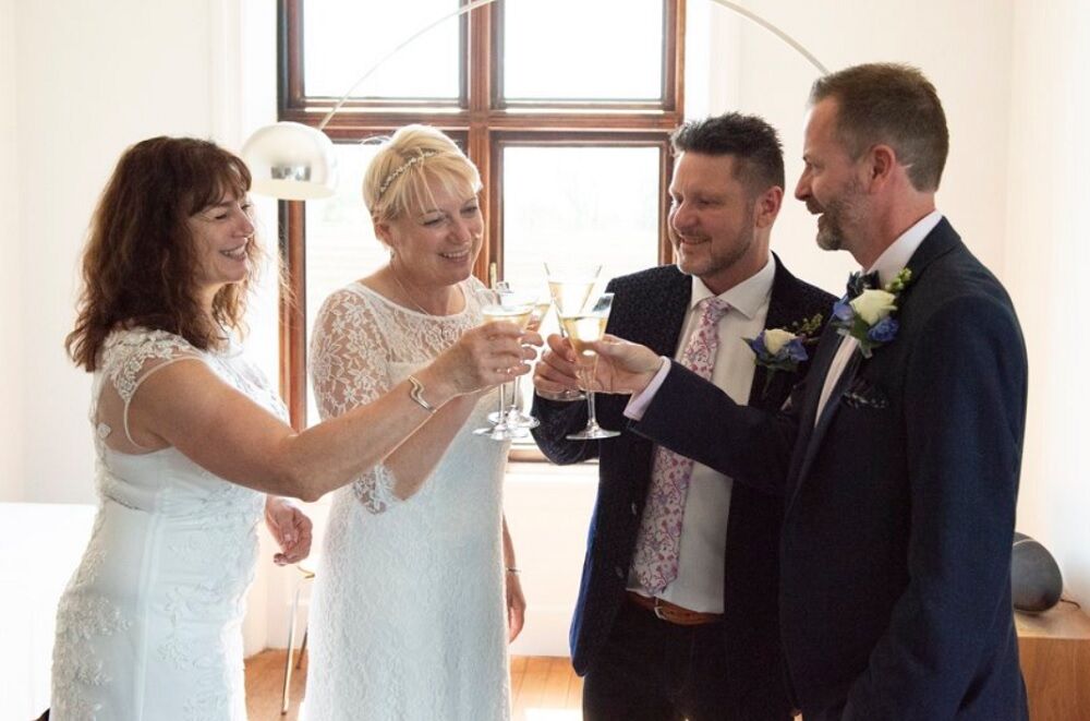 These best friends pretended to be a straight couple for years. Now they had a double wedding.