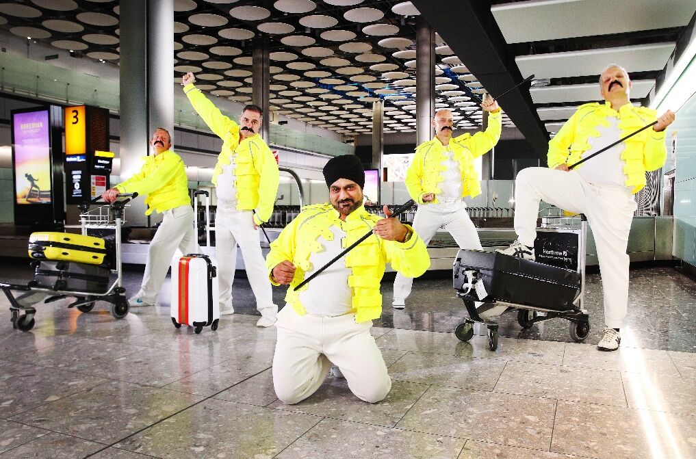 British Airways baggage handlers do their best Freddie Mercury impression to honor his birthday.