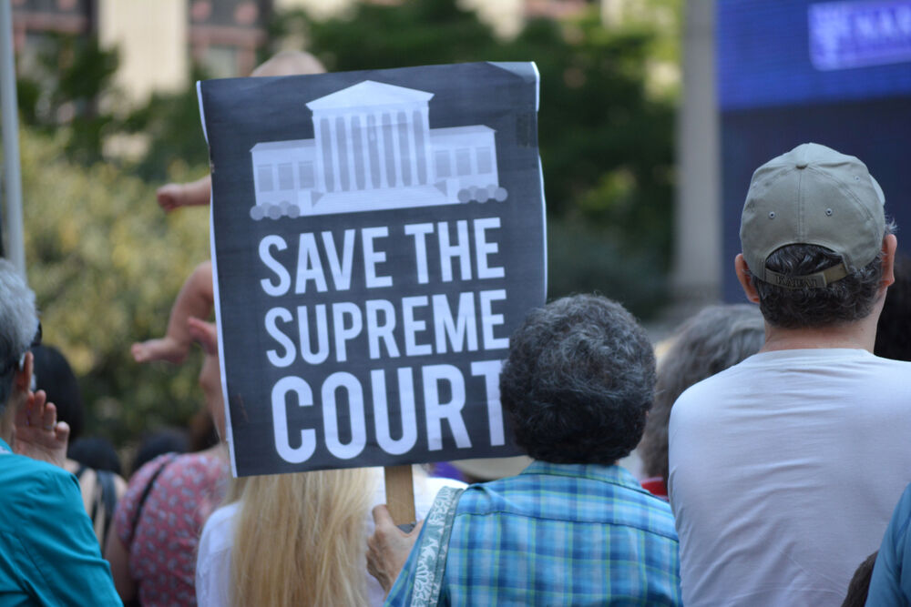 August 26, 2018 - Signs at a Unite for Justice rally against Supreme Court nominee Brett Kavanaugh in Lower Manhattan.