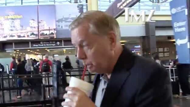 Republican Senator Lindsey Graham denying that he is gay to a reporter in Washington National Airport.