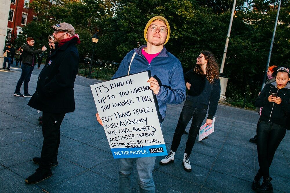 Activists protested the Trump administration's proposed attempt to erase transgender people from civil rights law by radically redefining the word "gender."