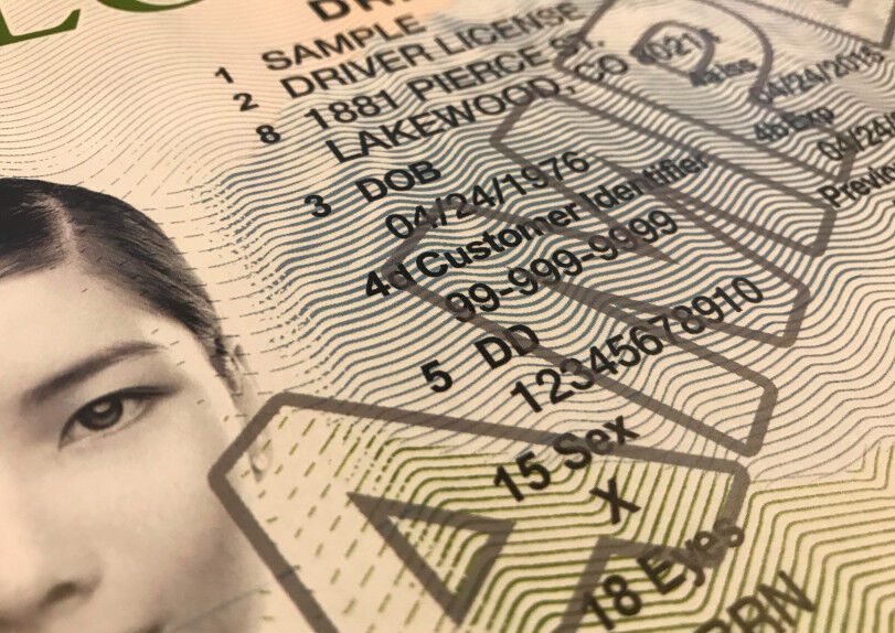 A close up of a sample Colorado drivers license with an "x" as the gender identifier.