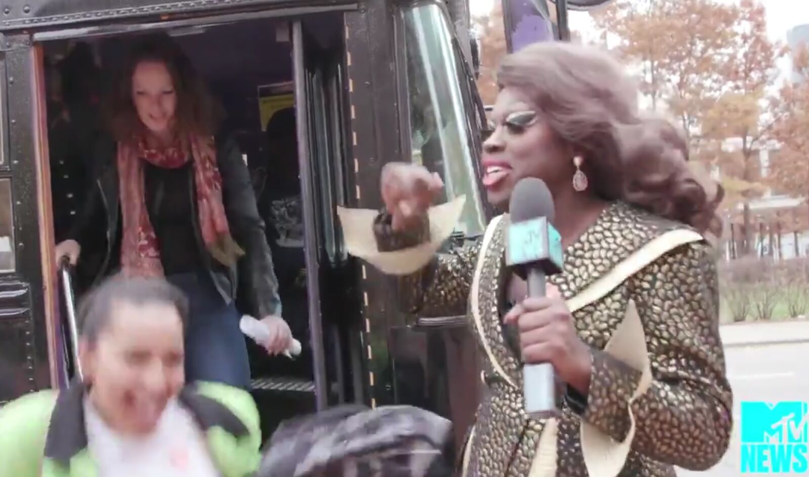 Bob the Drag Queen gets people off the bus and to the polls.