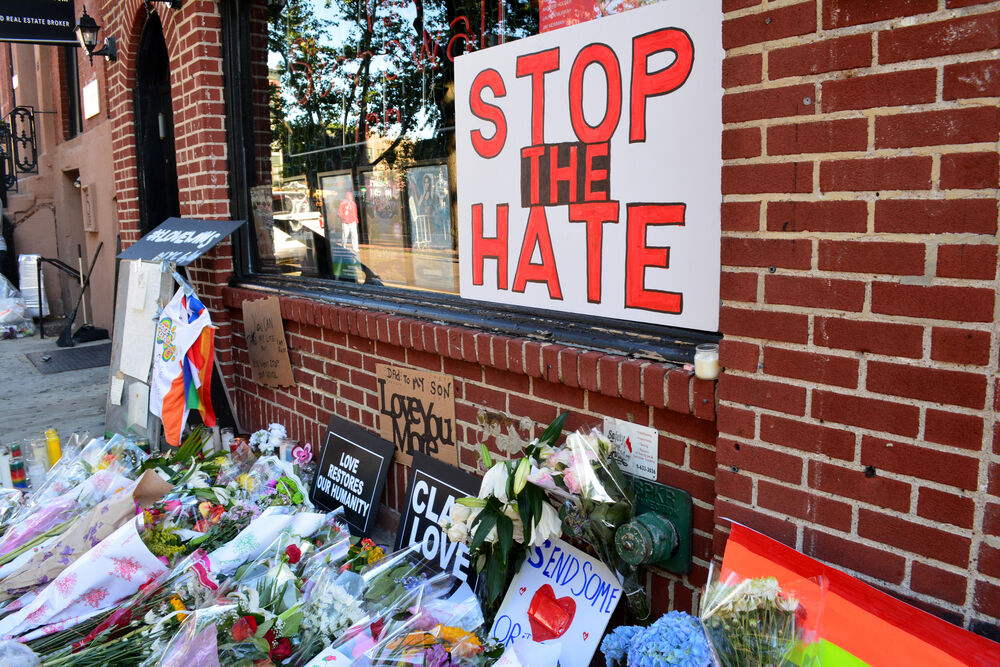 New York City, USA - June 13, 2016: Memorial outside the landmark Stonewall Inn for the victims of the mass shooting at Pulse nightclub in Orlando, Florida.