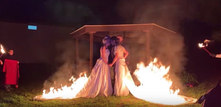 April Jennifer Choi, 32, and Bethany Byrnes, 28, set their dresses on fire during their wedding ceremony.