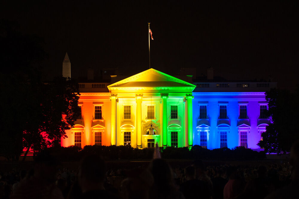 white house lit in gay pride colors