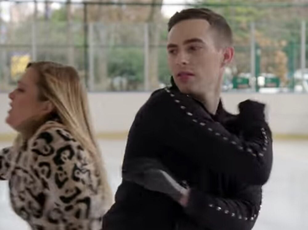 Samantha Bee skating past Adam Rippon