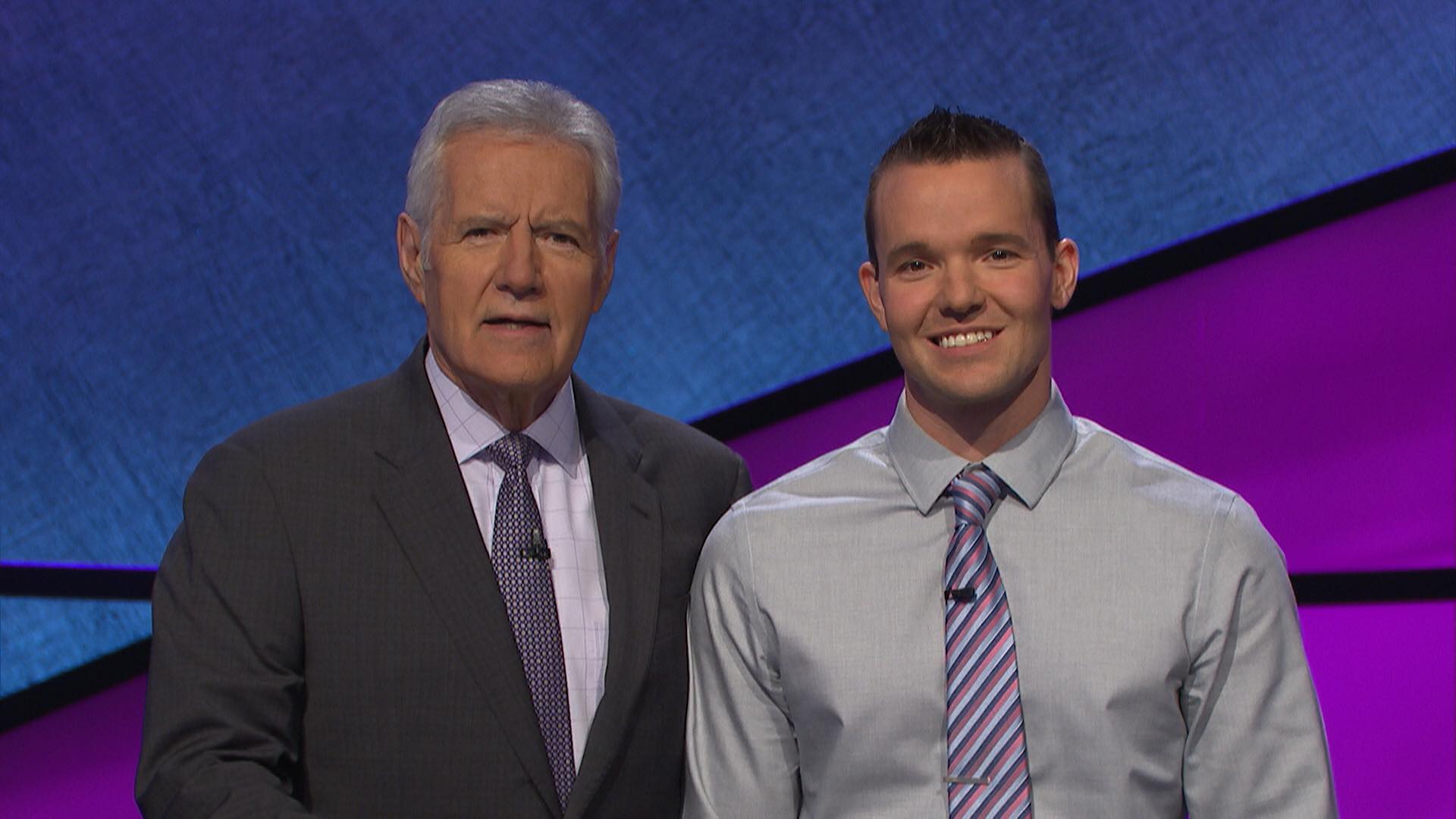 Jeopardy host Alex Trebek and contestant John Presloid