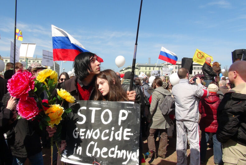 Russia, anti-LGBTQ purge, crackdown, Chechnya, protest, Russia, protestors, couple, gay