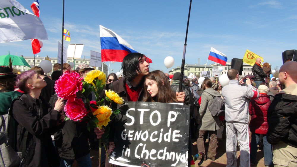 Russia, anti-LGBTQ purge, crackdown, Chechnya, protest, Russia, protestors, couple, gay