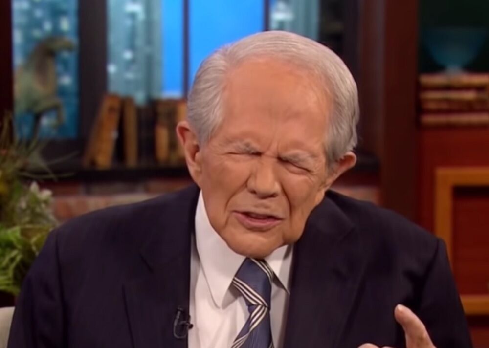 Pat Robertson with his eyes closed