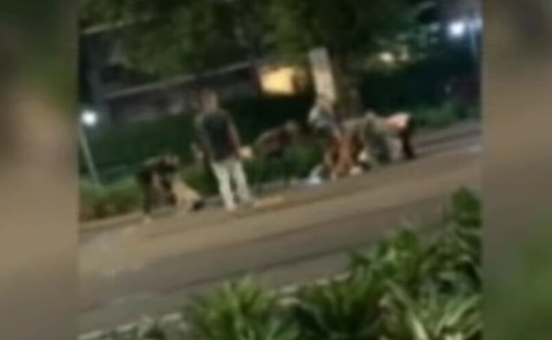 A blurry image of the altercation
