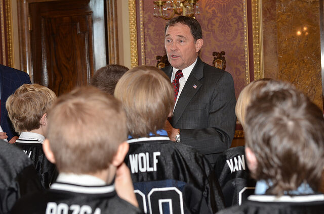 Utah Governor Gary Herbert speaks to the Pee Wee Alto White Champion football team in March 2013.