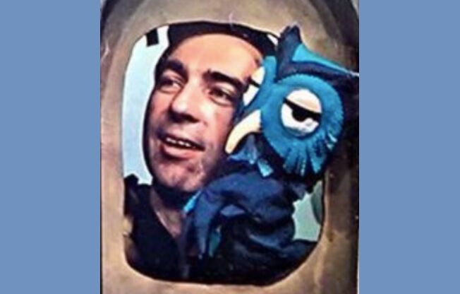 Mr. Rogers with an owl puppet