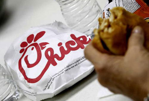 A Chick-fil-a sandwich with the logo