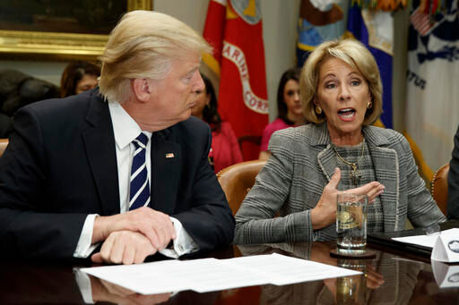 Donald Trump and Betsy Devos