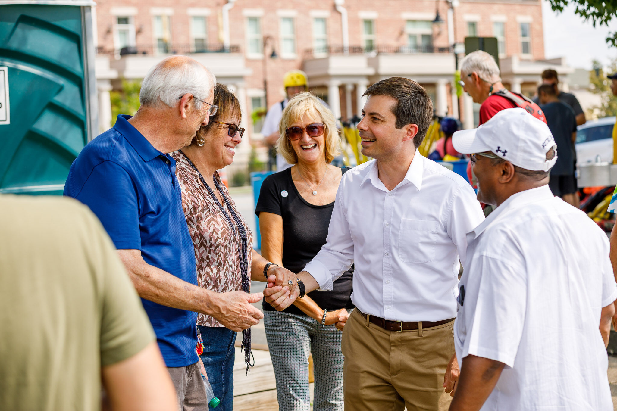 South Bend, Indiana mayor Pete Buttigieg shakes hands with voters on the campaign trail