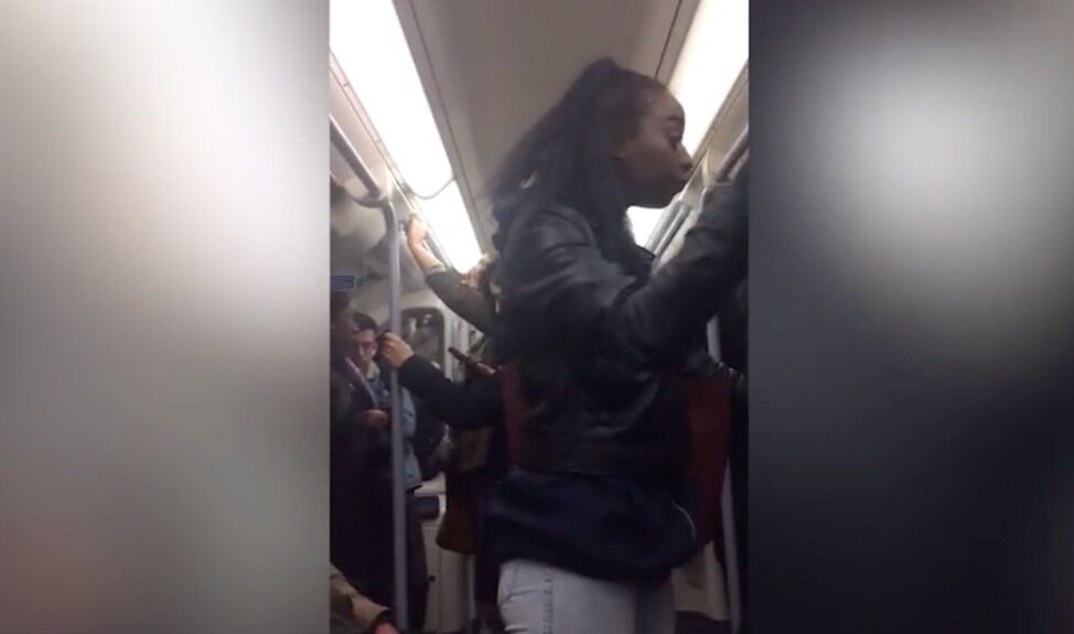 This woman began to verbally and physically assault a gay man on the London Underground