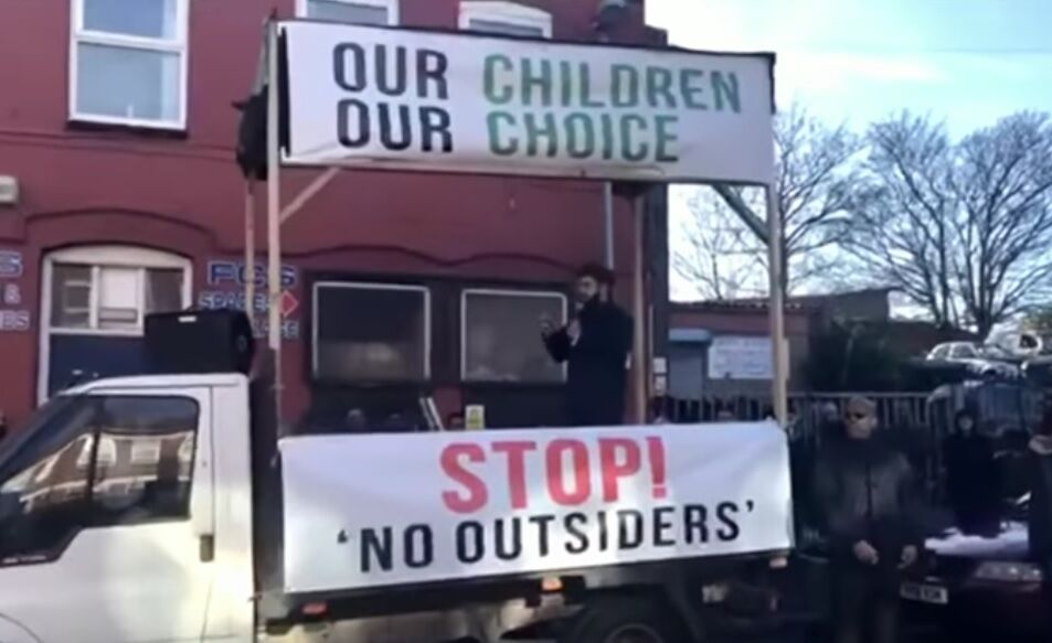 Protestor in Birmingham with the banners "Our Children Our Choice" and "Stop No Outsiders"