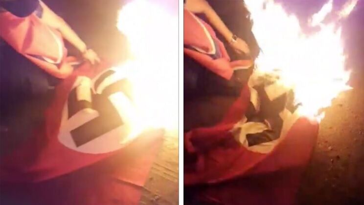 The Nazi flag being burned