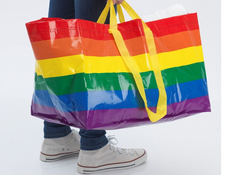 The rainbow Ikea bag, held by someone
