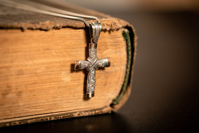 Religious book with cross