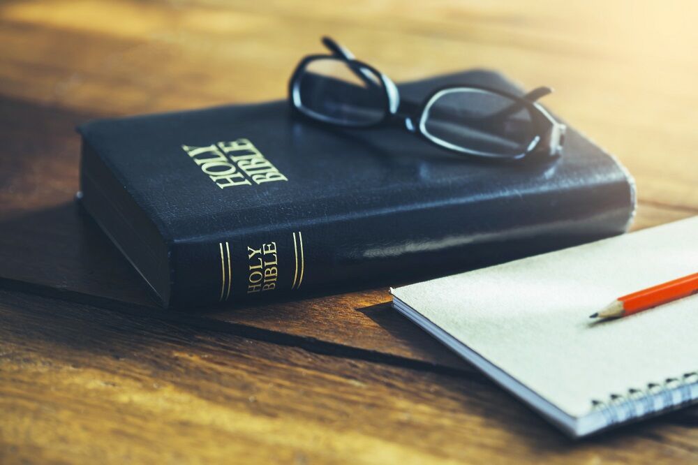 A bible and a notepad