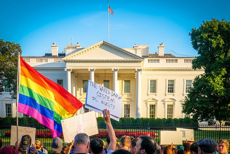 Protest at White House with a rainbow flag