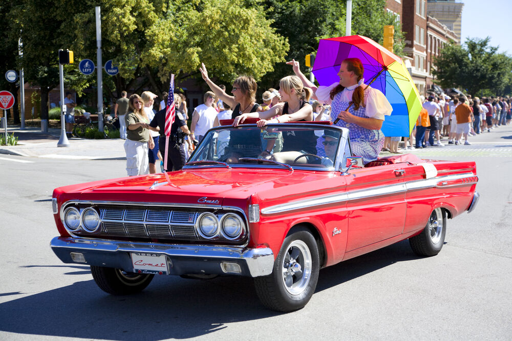 Indy Pride participants ride a float in the annual celebration of LGBTQ pride