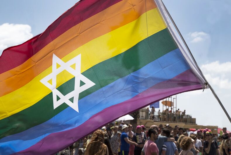 The pride flag with a Star of David on it