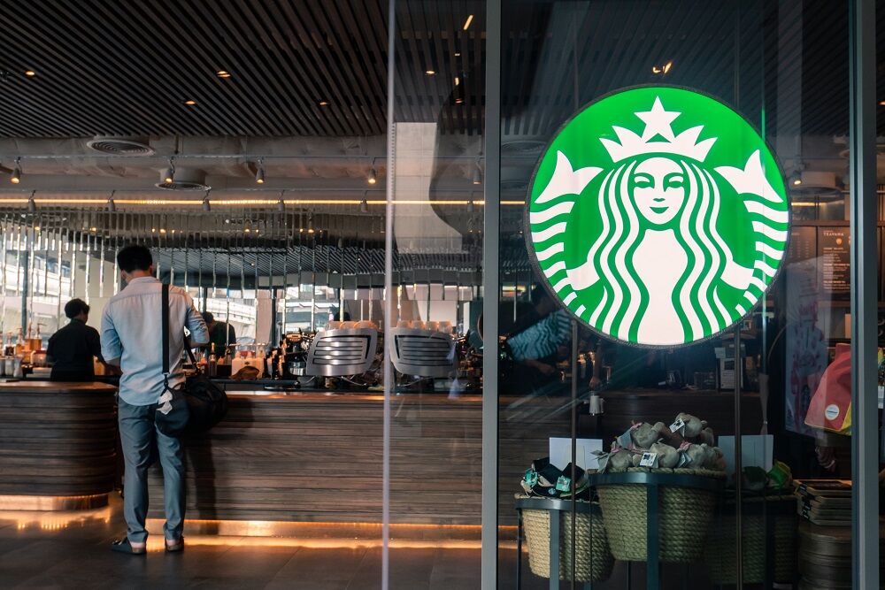 A man at the counter at Starbucks