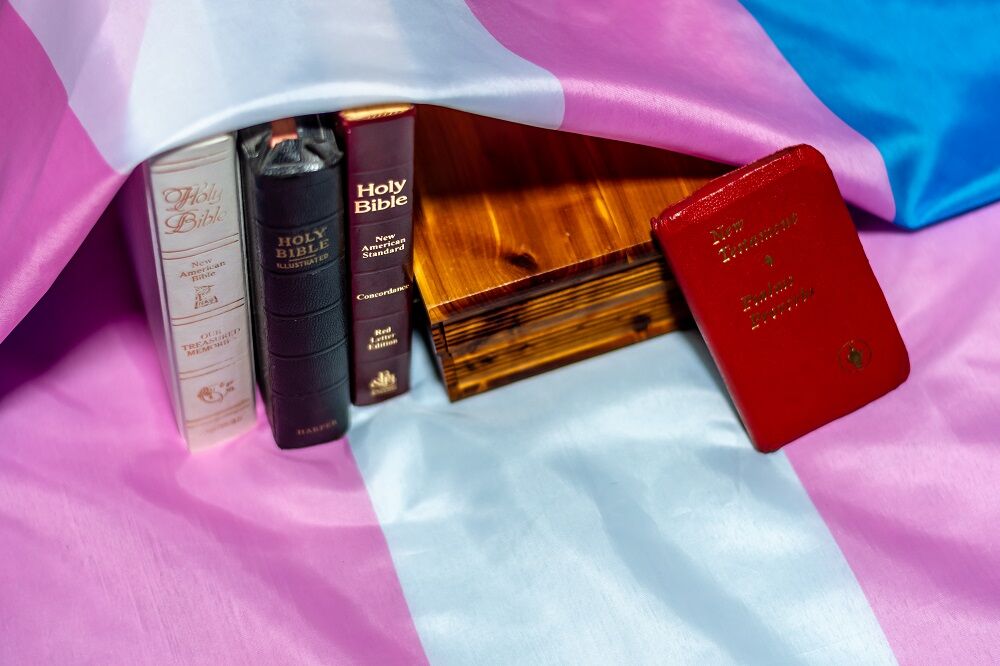 Trans flag and Christian books