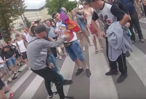 Bigots attack Pride march by throwing bricks & burning rainbow flags