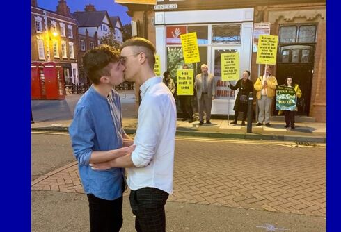 Christians have been protesting a play in this town. So 2 men kissed in front of them.