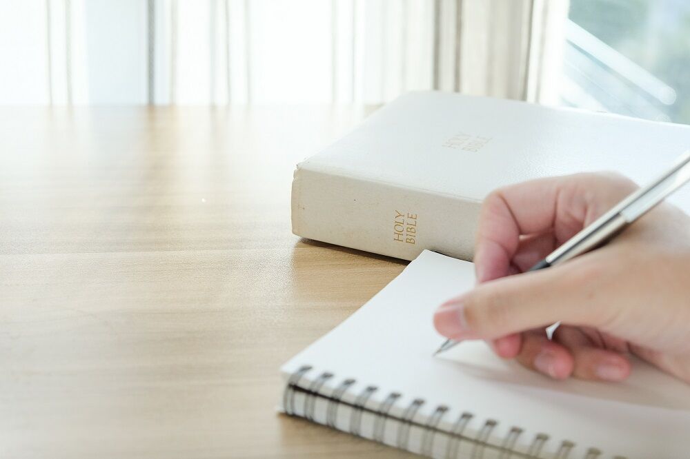 A notebook and a Bible