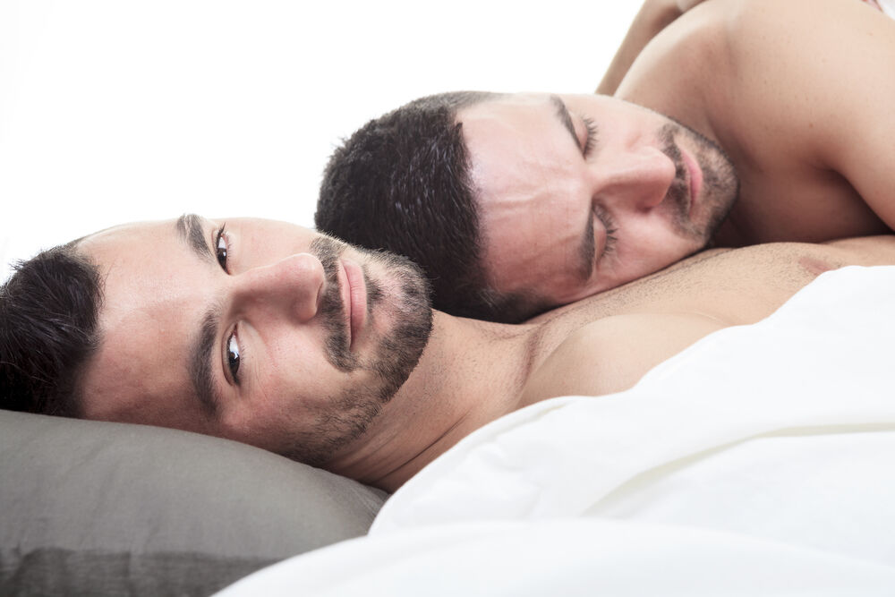 A gay couple in bed