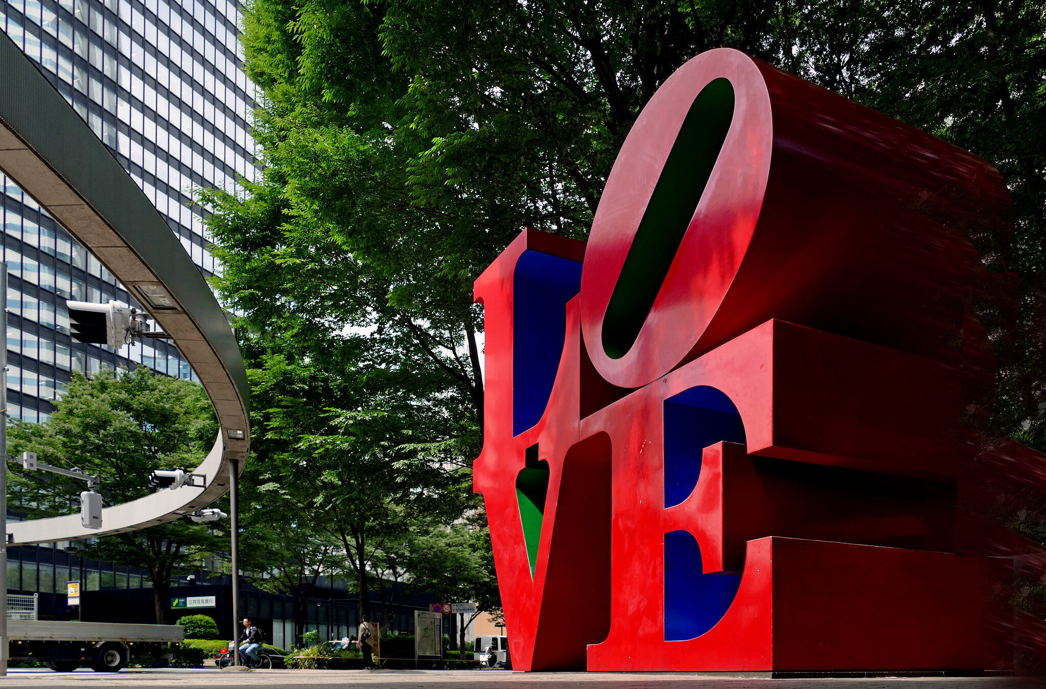 The gay L-O-V-E story behind the iconic image adored around the world