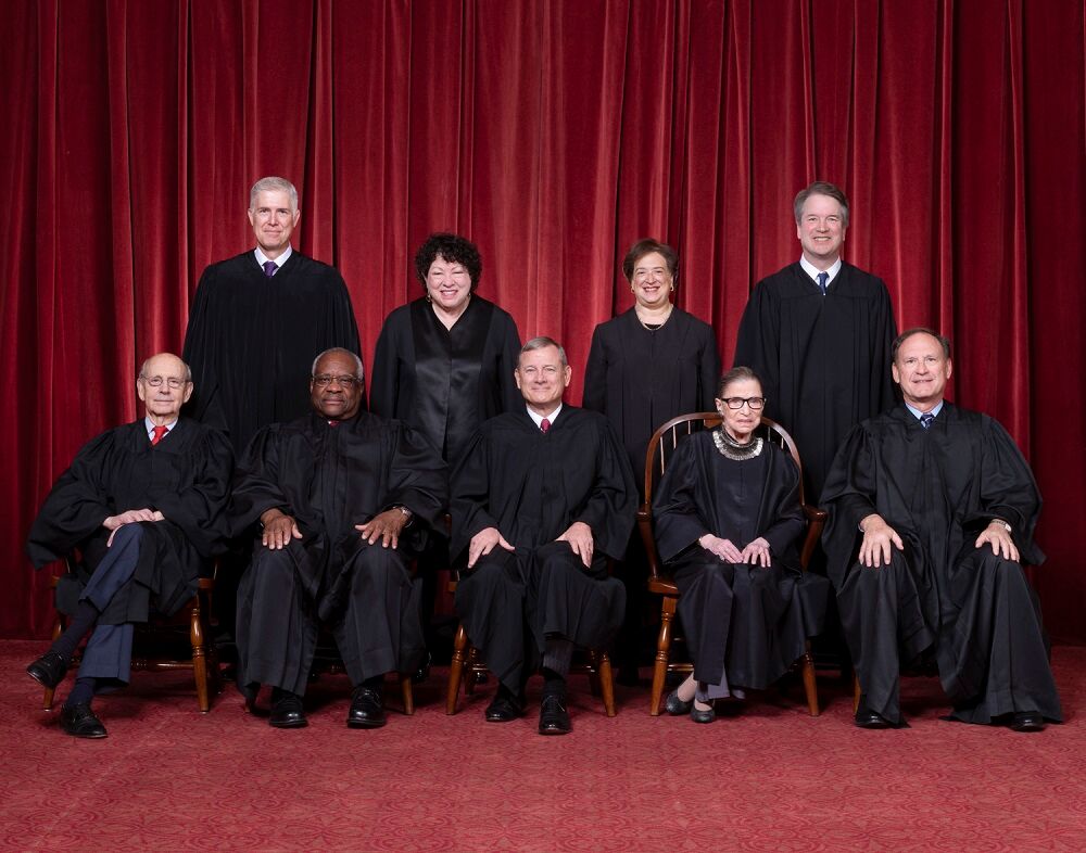The Roberts Court, November 30, 2018. Seated, from left to right: Justices Stephen G. Breyer and Clarence Thomas, Chief Justice John G. Roberts, Jr., and Justices Ruth Bader Ginsburg and Samuel A. Alito. Standing, from left to right: Justices Neil M. Gorsuch, Sonia Sotomayor, Elena Kagan, and Brett M. Kavanaugh.