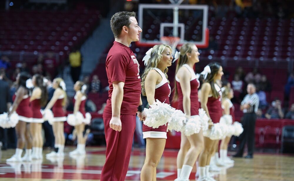 The Temple Owls cheerleaders perform on the court during the NCAA basketball game November 30, 2014, in Philadelphia.