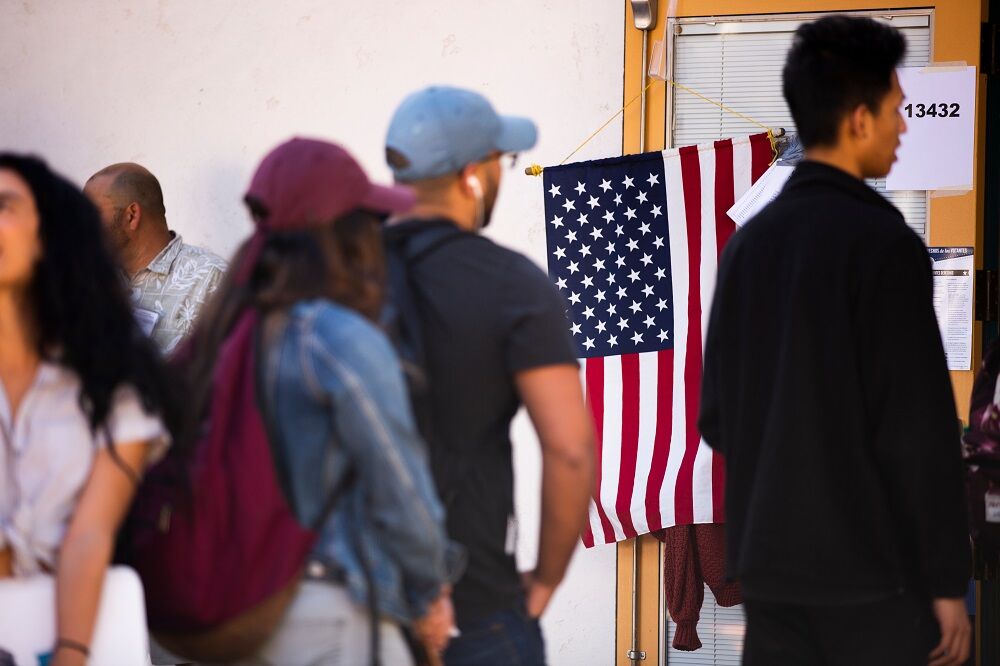 November 6, 2018: Voters wait in line at a Fullerton polling place to vote in the 2018 Midterm Elections