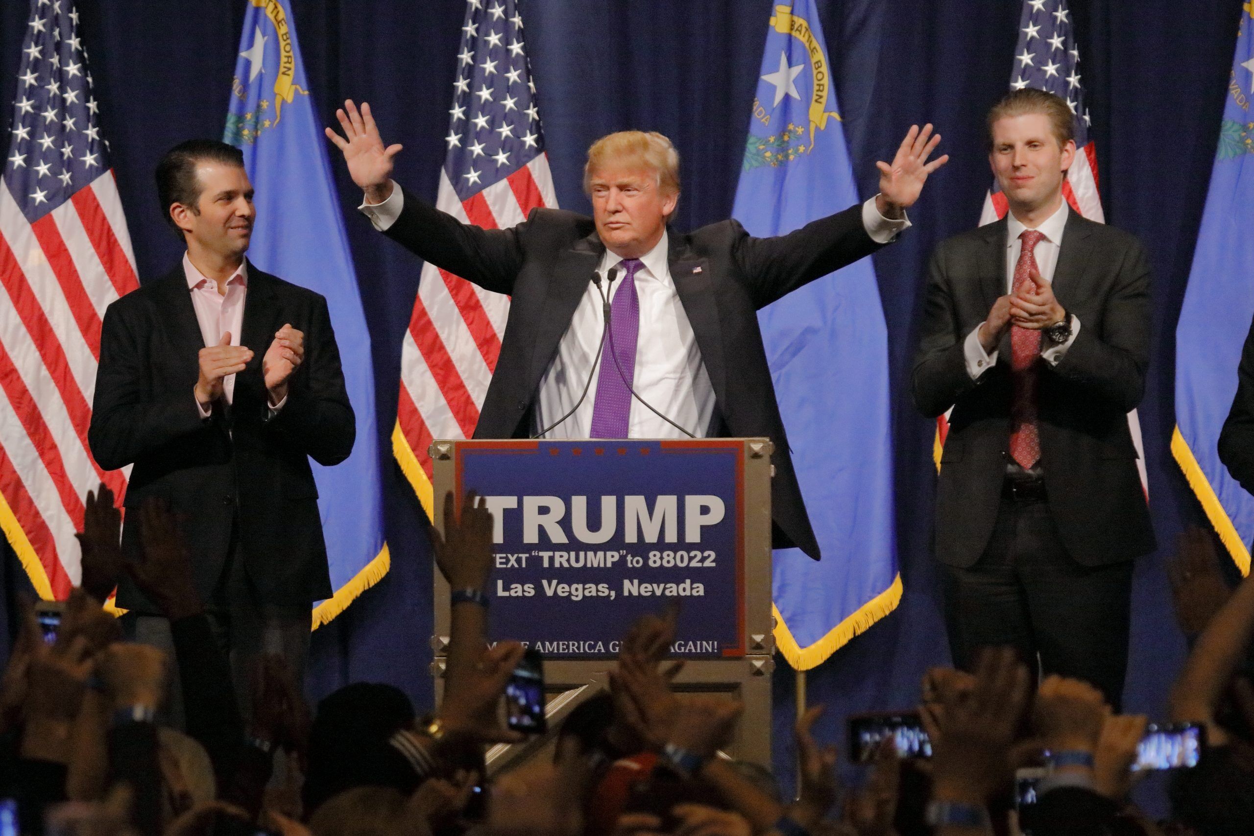FEBRUARY 23, 2016: Donald Trump is flanked by sons Eric (Right) and Donald Jr. (Left) during Mr. Trump's victory speech after Nevada caucus