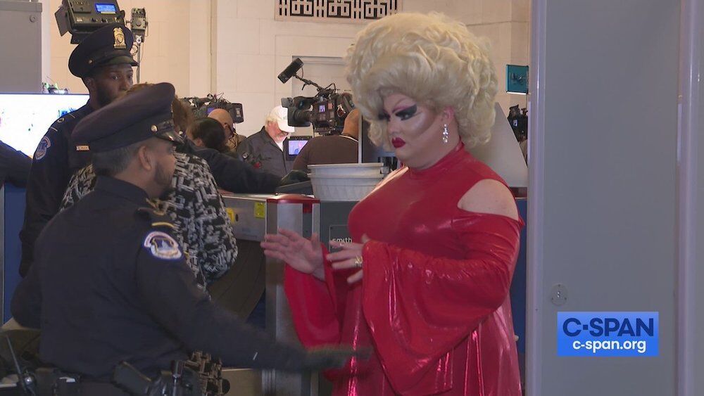 Pissi Myles, a drag queen from New Jersey, gets searched by officers in the Longworth House, an office used by the U.S. House of Representatives, while attending the Trump impeachment hearings.