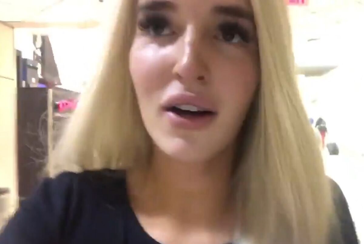 A woman was reduced to tears after being detained at airport because