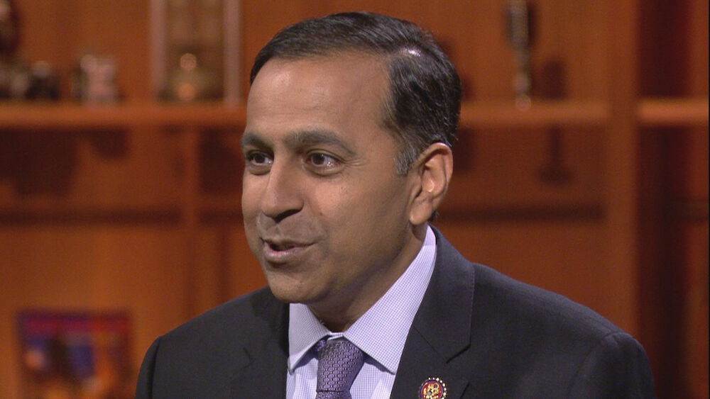 U.S. Representative Raja Krishnamoorthi speaks on camera. He's wearing a suit and tie.